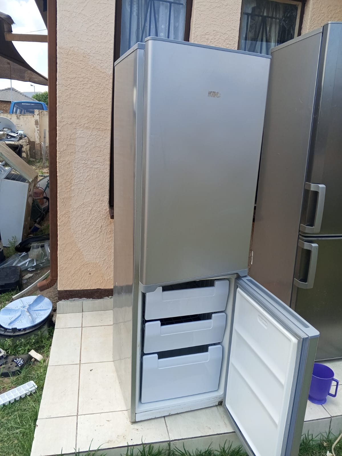 Freezer drawers and door seal of a fridge-freezer opened up during a TIQ Group service
